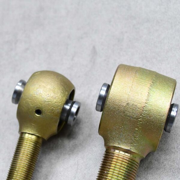 Side view of two different-sized Johnny joints, offering flexibility and durability for suspension systems.