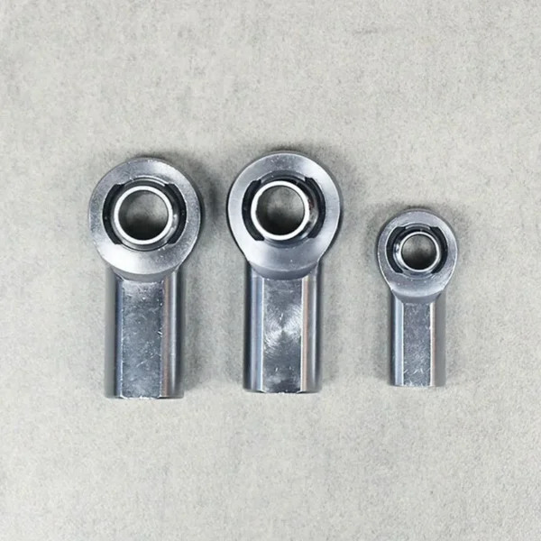 Front view of three female thread rod ends for precise suspension control.