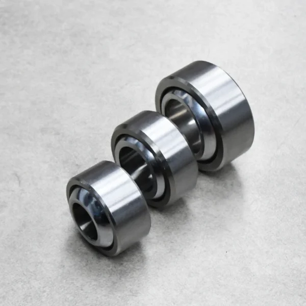 Three spherical plain bearings arranged in a row for enhanced suspension flexibility.