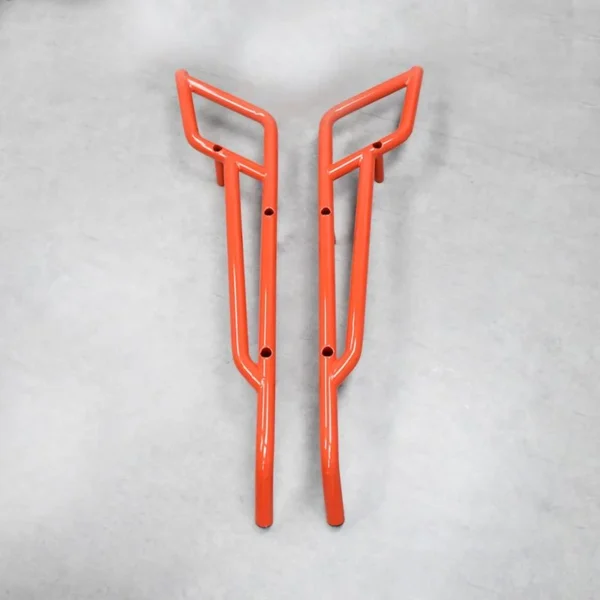 A pair of orange-colored nerf bars designed for the Can-Am Maverick X3 for improved protection and performance.