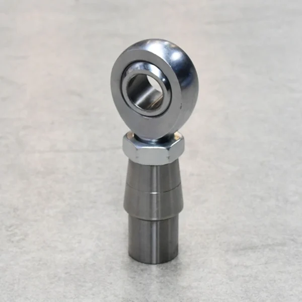 A rod end kit with tube adapter and jam nuts, designed for suspension and steering systems.
