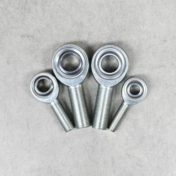 Four heavy-duty JMX rod ends for suspension and steering control.