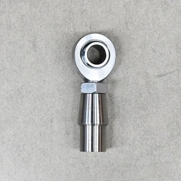 Front view of a rod end kit with tube adapter and jam nuts for suspension systems.