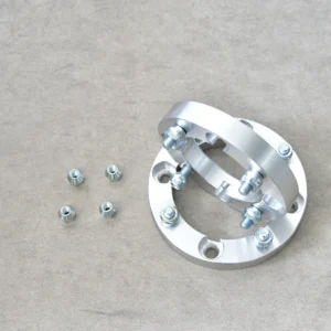 Wheel spacers and nuts used to increase wheel clearance and improve vehicle handling.