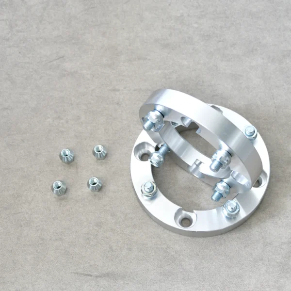 Wheel spacers and nuts used to increase wheel clearance and improve vehicle handling.