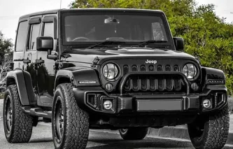 Black Jeep Wrangler SUV parked outdoors