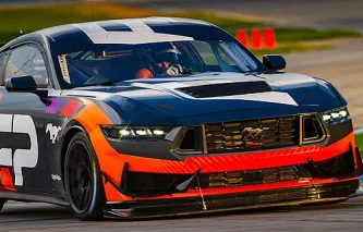 Ford Mustang race car on a track