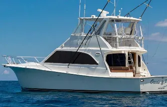 White sport fishing boat on the ocean