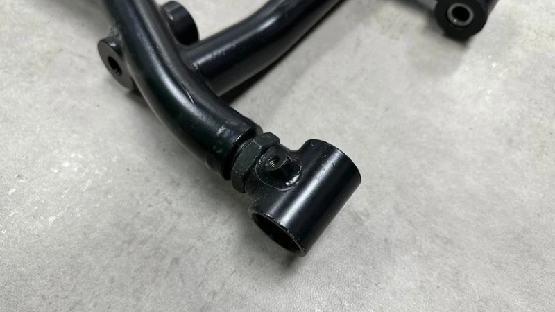 Close-up of A-arm pivot block.