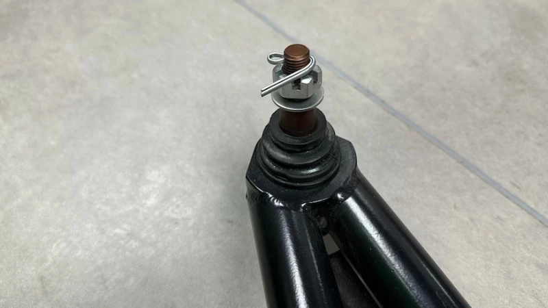 Close-up of ball joint on A-arm suspension.
