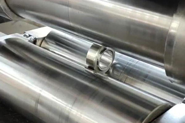Spherical bearing shaft turning
