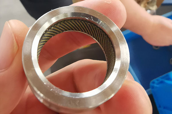 Spherical bearing PTFE liner detail