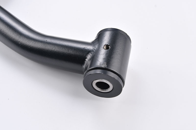 Bushing fit detail on an A-arm assembly