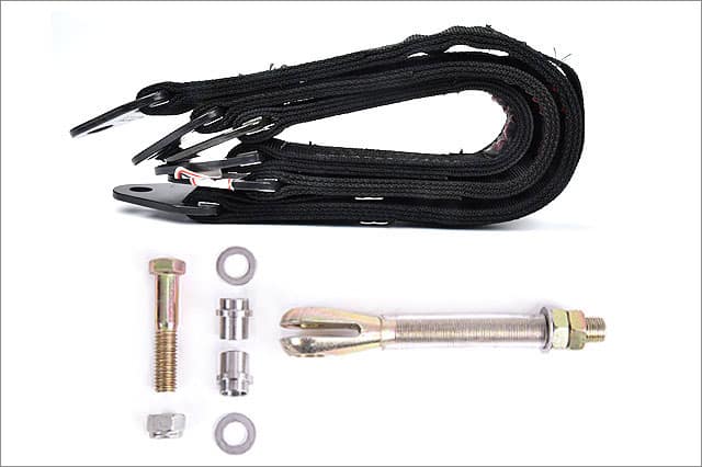 Black bungee cords with hooks and an assortment of mounting hardware (bolt, washers, pins) for securing cargo or securing loads to a vehicle alike a tie-down kit.