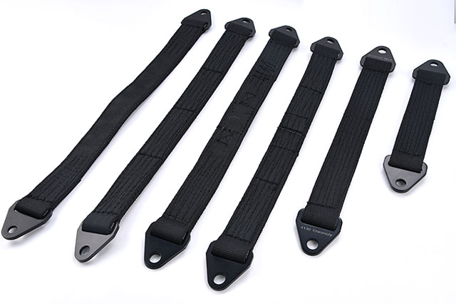 Six black nylon webbing straps with metal hooks on each end laid out diagonally on a white background.